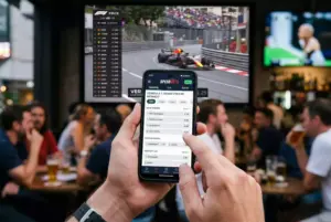 Pantalla de app de apuestas mostrando opcion de cash out durante carrera F1